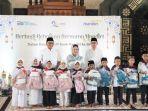 Rayakan-HUT-ke-26-Bank-Mandiri-bagi-santunan-pendidikan.jpg