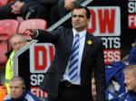 Roberto-Martinez-nunjuk-lapangan-kosong.jpg