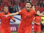 Selebrasi-striker-Timnas-China-Behram-Abduweli.jpg