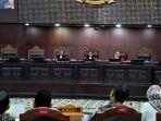 Rojikinnor-Vina Panduwinata Dalilkan Ada Bagi-bagi Bansos Sarung di Pilwalkot Palangka Raya