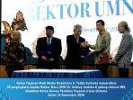 Teddy-Surianto-menyerahkan-SK-Pengangkatan-kepada-Rektor-Baru-Andrey-Andoko-DokUMN.jpg