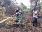 Viral! Aksi Kapten Kowad Karnilawati Pimpin Pemadaman Karhutla di Riau