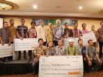 acara-asian-agri-bagikan-hasil-penjualan-minyak-sawit-rp-26-miliar-kepada-29000-petani-sawit_20161222_165522.jpg