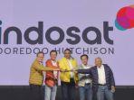 acara-merger-indosat-dan-tri.jpg