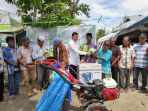 act-pray4palu-memberi-bantuan-traktor-untuk-palu_20190311_085551.jpg