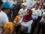 adiati-noerdin-saat-menerima-tanah-dan-air_20170806_225659.jpg