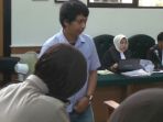 adik-kandung-terdakwa-bos-first-travel-andika-surachman_20180326_113938.jpg