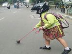 adik-pemungut-ranjau-paku_20180530_214833.jpg