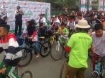 ajang-sosialisasi-asian-para-games-2018-di-pontianak-diramaikan-ribuan-peserta-sepeda-nusantara_20180930_223146.jpg