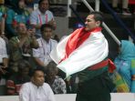 aji-bangkit-pamungkas-meraih-emas-ke-16-indonesia_20180827_173738.jpg