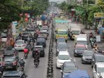 akibat-banjir-di-kaligawe-jalan-majapahit-semarang-macet_20210208_132333.jpg