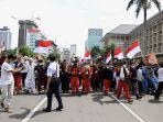 aksi-1812-desak-pembebasan-rizieq-shihab-dibubarkan-aparat_20201218_185245.jpg