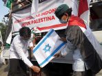 aksi-bela-palestina-di-depan-kedubes-amerika-serikat_20210518_202007.jpg