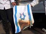 aksi-bela-palestina-di-depan-kedubes-amerika-serikat_20210518_202143.jpg