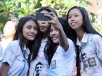 aksi-corat-coret-dan-konvoi-kelulusan-sma-di-bali_20150515_152524.jpg