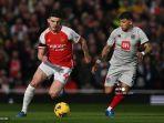 aksi-declan-rice-mengawal-lini-tengah-arsenal.jpg