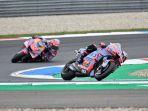 aksi-dua-pebalap-gresini-racing-motogp-enea-bastianini-dan-fabio-di-giannantonio.jpg