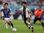 aksi-ilkay-gundogan-saat-melawan-jepang-di-piala-dunia-2022.jpg