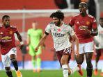 aksi-mohamed-elneny-bersama-arsenal-kala-melawan-manchester-united.jpg