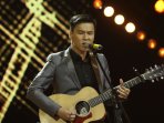 aksi-panggung-aldy-saputra-di-x-factor-indonesia_20150620_170242.jpg