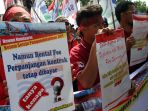 aksi-pekerja-pelabuhan-di-kementerian-bumn_20170731_202042.jpg