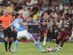aksi-pemain-manchester-city-rodri-saat-melawan-fluminese-di-final-piala-dunia-antarklub.jpg