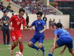 aksi-pemain-timnas-indonesia-u-23-rachmat-irianto-saat-menghadapi-thailand.jpg