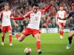 aksi-penyerang-bayern-munchen-jamal-musiala-saat-melawan-real-madrid.jpg
