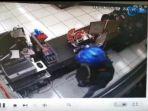 aksi-perampokan-di-minimarket-terekam-cctv.jpg