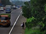 aksi-petugas-jaga-tol-purbaleunyi_20210316_220853.jpg