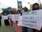 aksi-solidaritas-dari-pemuda-muslim-di-kota-palu-untuk-korban-penembakan-di-selandia-baru.jpg