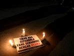 aksi-solidaritas-tragedi-kanjuruhan-malang_20221002_210543.jpg