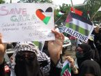 aksi-solidaritas-untuk-palestina-di-masjid-agung-palembang_20231103_201404.jpg