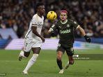 aksi-striker-real-madrid-vinicius-junior-saat-melawan-girona-di-liga-spanyol.jpg