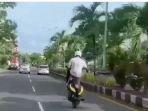 aksi-turis-asing-freestyle-di-jalan-raya-viral-di-bali.jpg
