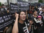 aksi-unjuk-rasa-menentang-konsumsi-daging-anjing-di-seoul-korea-selatan.jpg