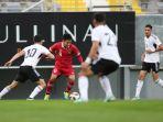 aksi-winger-timnas-indonesia-witan-sulaeman-saat-melewati-pemain-libya.jpg