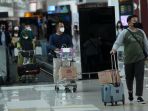 aktivitas-penumpang-di-bandara-seotta-jelang-nataru_20211220_195906.jpg