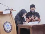 aktris-oki-setiana-dewi-raih-gelar-doktor-dengan-predikat-cumlaude.jpg