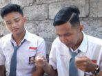 albert-feri-bersama-temannya-saat-menjelaskan-kepada-tribun-bali.jpg