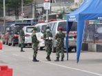 ambulance-hilir-mudik-di-rumah-sakit-darurat-wisma-atlet_20200326_151340.jpg