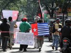 amp-komite-kota-bandung-peringati-54-tahun-hari-aneksasi-papua_20160503_140520.jpg