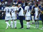 ancelotti-bersama-skuad-real-madrid.jpg