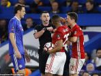 ander-herrera-antonio-valencia-wasit-michael-oliver_20170315_095510.jpg