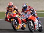 andrea-dovizioso-dan-marc-marquez_20181019_213035.jpg
