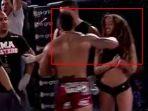 andrew-whitney-memukul-ring-girl.jpg