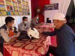 anggota-dprd-jawa-barat-fraksi-pan-hasbullah-rahmat-kanan-saat-meninjau-pos.jpg