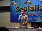 anggota-komisi-xi-dpr-ri-primus-yustisio-saat-sosialisasi-qris.jpg
