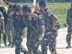 anggota-tni-korban-penyerangan-kkb-dievakuasi-27-maret-2022.jpg