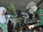 ani-bangga-melihat-pameran-alutsista-tni_20151218_135800.jpg